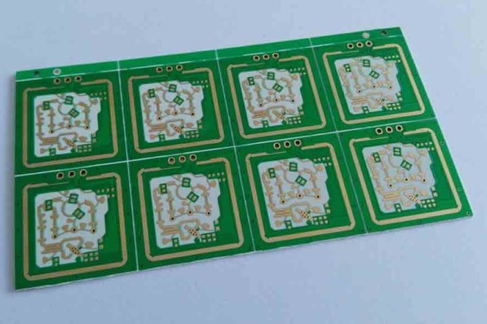 Panel of eight small circuit modules in a green support panel