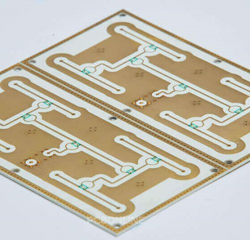 Ceramic panel with four patterned circuit areas and curved conductor paths