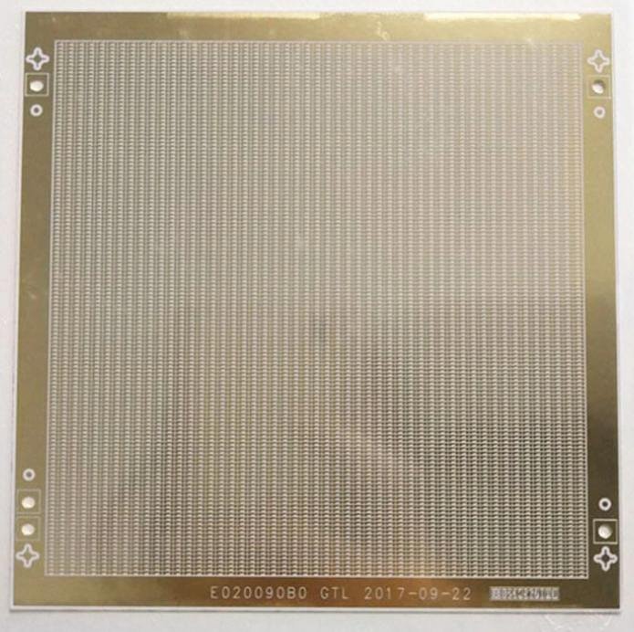 Square ceramic circuit sample with a dense repeated conductor pattern